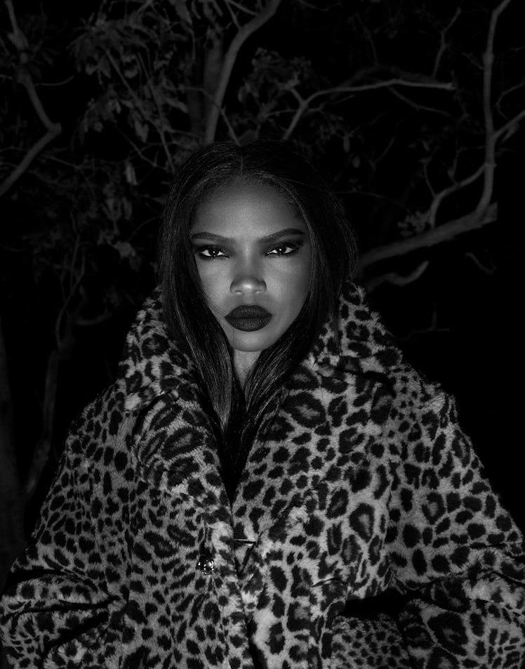 Ryan Destiny in leopard coat