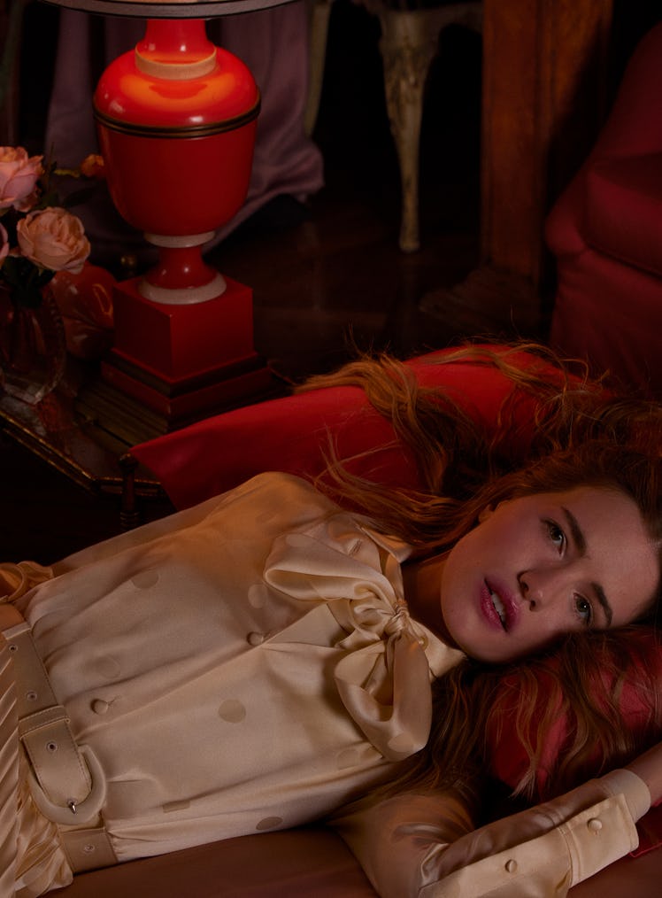 Willa Fitzgerald wears a Balenciaga belted dress and bodysuit.