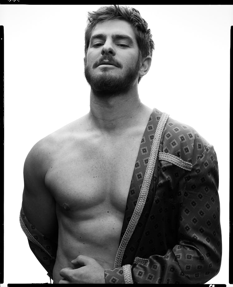 Andrew Garfield wears a Celine Homme by Hedi Slimane robe.