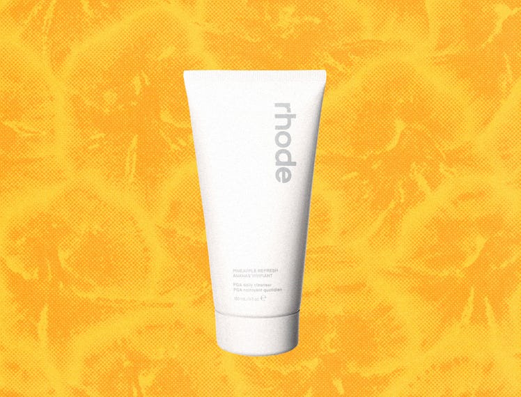 a bottle of rhode's cleanser against a yellow background