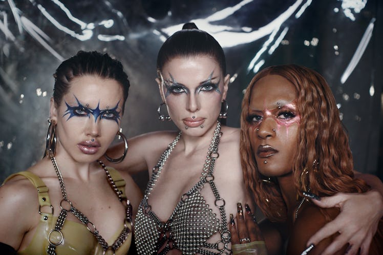 Isamaya Ffrench, Julia Fox and Richie Shazam wearing shimmering face makeup and latex outfits