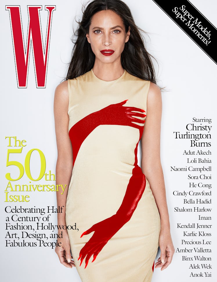 Christy Turlington Burnes in a beige and red dress on the cover of W Magazine's 50th anniversary iss...