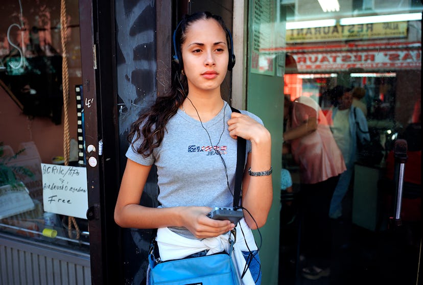 Glendalis with her walkman standing in front of a store on the Lower East Side of Manhattan in the 1...