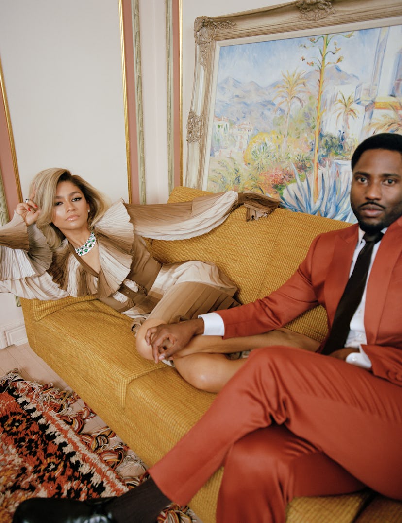 zendaya and john david washington sitting on a couch