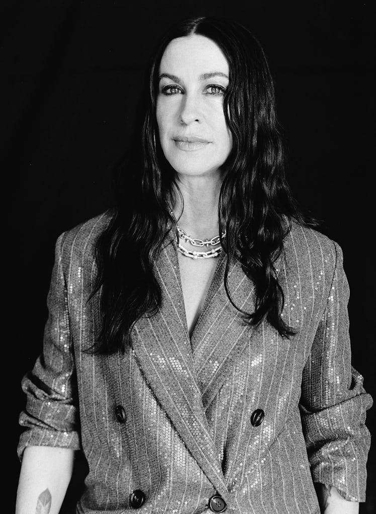 Alanis Morissette wears a Brunello Cucinelli coat; Tiffany & Co. Tiffany Titan by Pharrell Williams ...